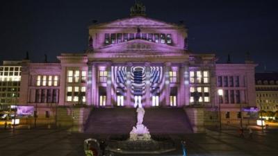 Lights and projections illuminate the German capital