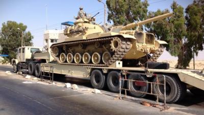 An Egyptian military tank is deployed in the northern Sinai town of Al-Arish (file photo)
