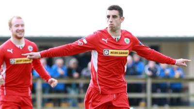 Cliftonville's Joe Gormley celebrates scoring against Ballinamallard at Ferney Park