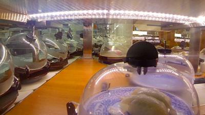 Plates on a conveyer belt