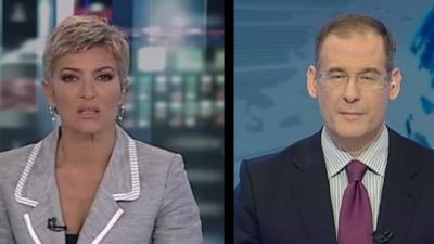 Presenters from two Greek state broadcasters operating simultaneously