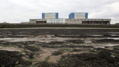 Mud surrounds the front of the old Hinkley Point