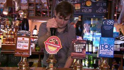 Man pulling a pint