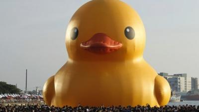 A giant yellow duck sits at the Glory Pier in the port of Kaohsiung, Taiwan