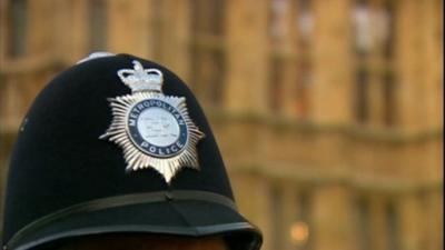 Policeman's hat near Houses of Parliament