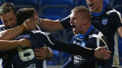 Alex Russell celebrates scoring a try against USA