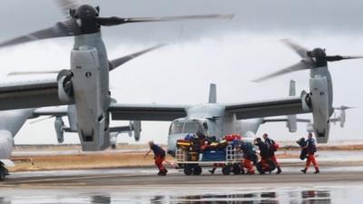 US Bell Boeing V-22 Osprey arrive at the airport to transport humanitarian workers to typhoon affected areas on November 14, 2013 in Tacloban, Leyte, Philippines to help people affected by typhoon