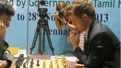 Magnus Carlson playing chess