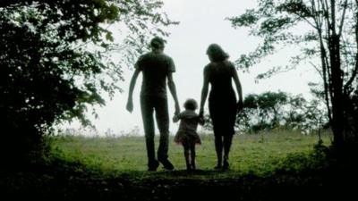 A family walking in the park