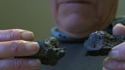 Lawrence Parkin with his suspected meteorite