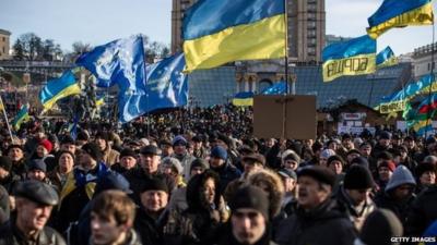 Protesters with flags in Independence Square