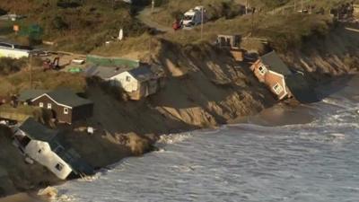 Damaged homes along the coast
