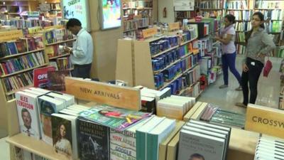 people in Indian bookshop