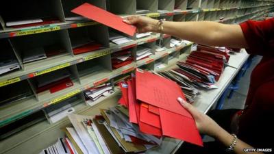 Christmas post being sorted at a Royal Mail sorting office