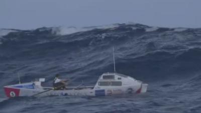 Talisker Whisky Atlantic Challenge rowing boat in rough sea