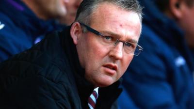 Paul Lambert watches his Aston Villa side suffering a 2-1 defeat at Stoke City