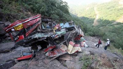 Remains of a bus crash near Mumbai, India