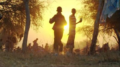 Children silhouetted in the Sun in South Sudan