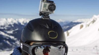 Skiier wears go-pro camera on helmet in Meribel