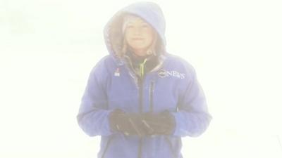 ABC news correspondent Linzie Janis in a snow storm in Buffalo in New York