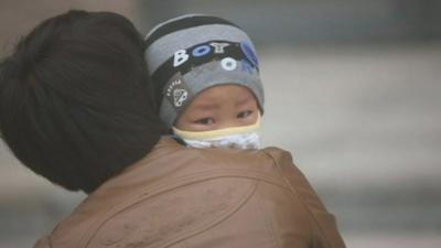 Child wearing a face mask