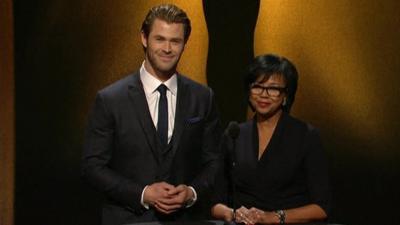 Chris Hemsworth and Academy President Cheryl Boone Isaacs