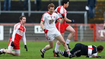 Niall McKenna celebrates his early goal against Derry