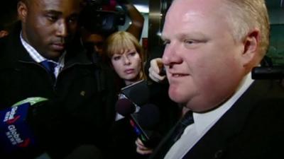 Rob Ford answers reporters questions