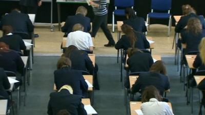 School pupils taking exams