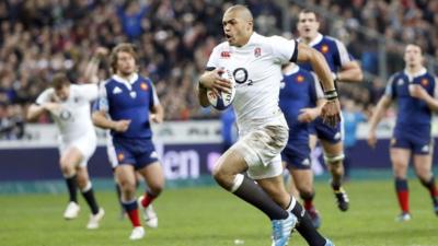 England's Luther Burrell scores against France