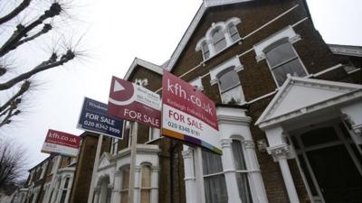 Signs outside London houses