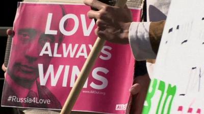 A poster reads 'Love Always Wins' at a gay rights protest in Jerusalem