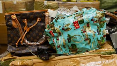 Counterfeit goods seized in Southampton including fake Louis Vuitton and Cath Kidston bags and Gucci sunglasses