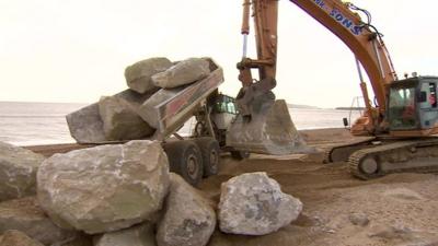 Digger on Weymouth beach