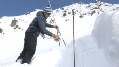 Researcher Ben Reuter using the snow micro pen