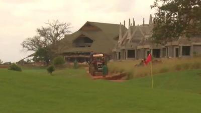 house being built by golf course