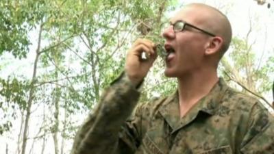 A US marine eating a scorpion