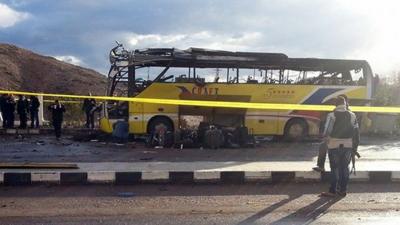 The wreckage of the tourist bus after a bomb explosion in the Egyptian south Sinai resort town of Taba