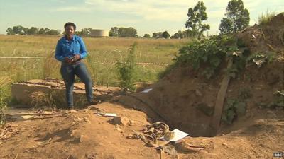 BBC reporter, Nomsa Maseko, at entrance to mine in Benoni