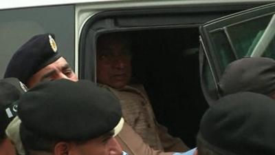 Pervez Musharraf inside car on arrival at court