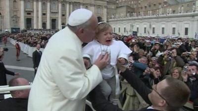 Pope Francis meets child dressed as him