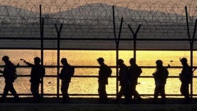 South Korean soldiers patrol the border