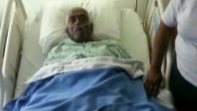 Walter Williams in hospital bed