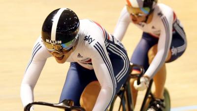 Jessica Varnish wins the all-British quarter-final in the women's individual sprint at the World Track Cycling Championships in Cali, Colombia on Friday.