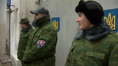 Men guarding military hospital