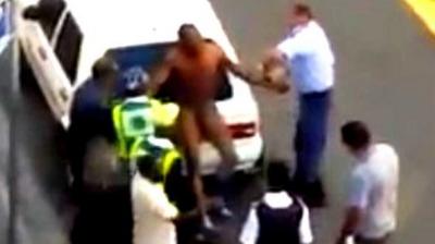 Video footage showing man attacked by South African police