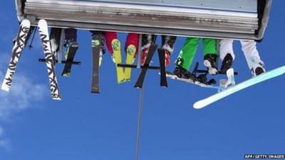 A family on a ski lift