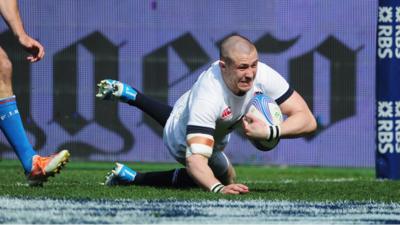 Mike Brown scores his second, and England's third try, to give them a 24-6 lead over Italy at half-time in their Six Nations match in Rome.