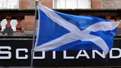 Scottish flag outside shop in Edinburgh