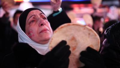 A woman holding bread